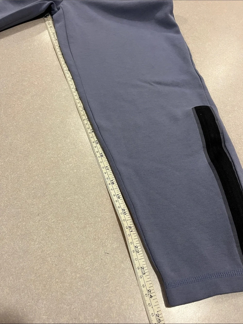 Nike Tech Light Blue Joggers with Black Accents
